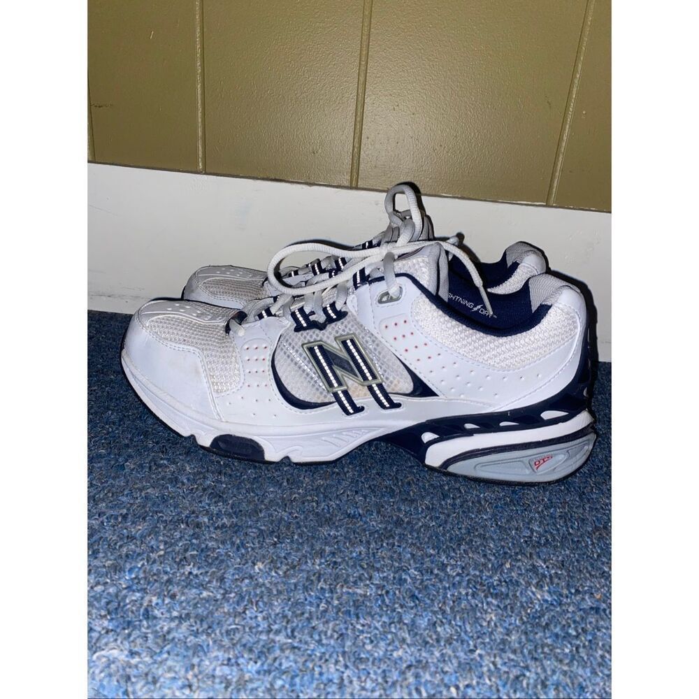 New Balance men size 10D 1009 tie up athletic shoes white/grey/navy blue